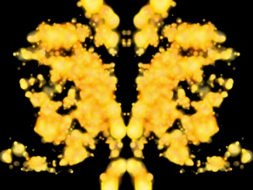 Symmetrinen keltainen musteläiskä mustalla taustalla