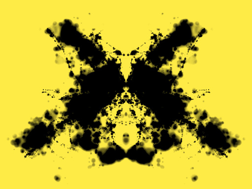 Symmetrinen musteläiskä keltaisella taustalla