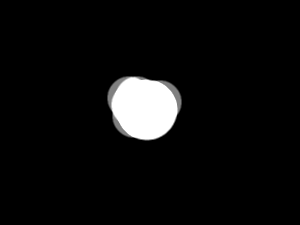 Valkoinen pallo jota harmaa ympäröi vain osittain